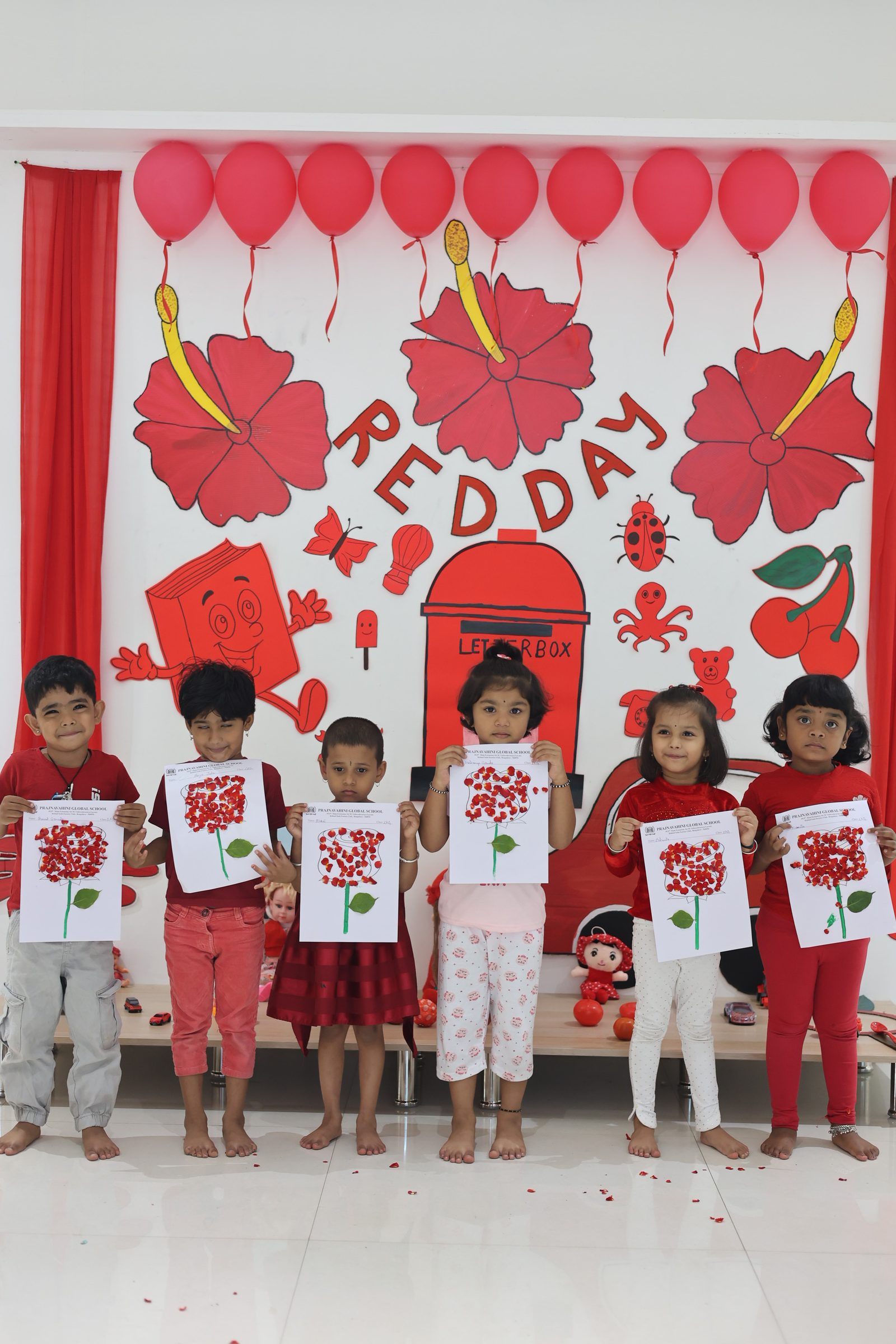 Little Artists with Their Red Day Craft
